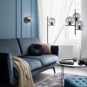 Stylish blue couch with decorative pillows