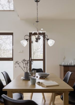 Dining room with fancy chandelier