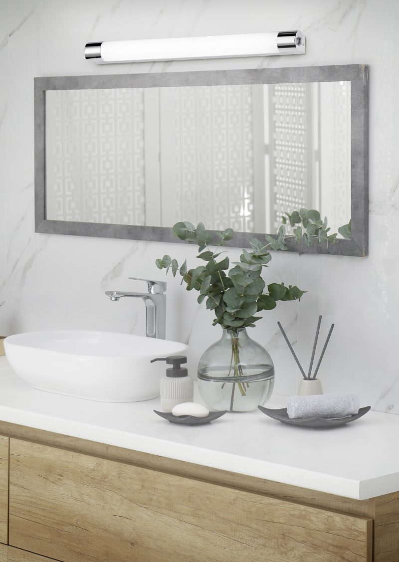 Modern bathroom interior with stylish mirror and vessel sink