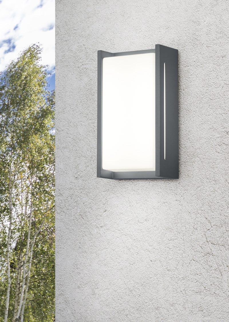 White stucco wall with metal ladder